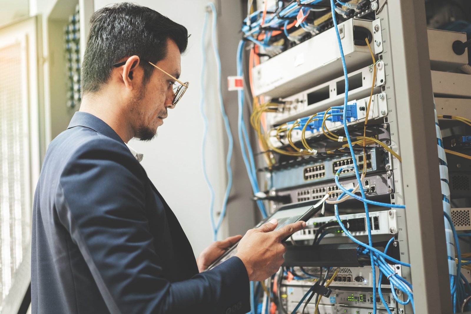 Network technician running vulnerability scans for a restaurant network